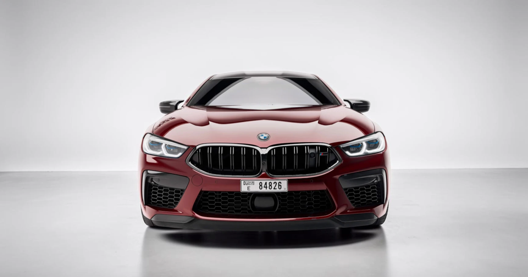 BMW M8 Competition Coupe — Motegi Red - View 2