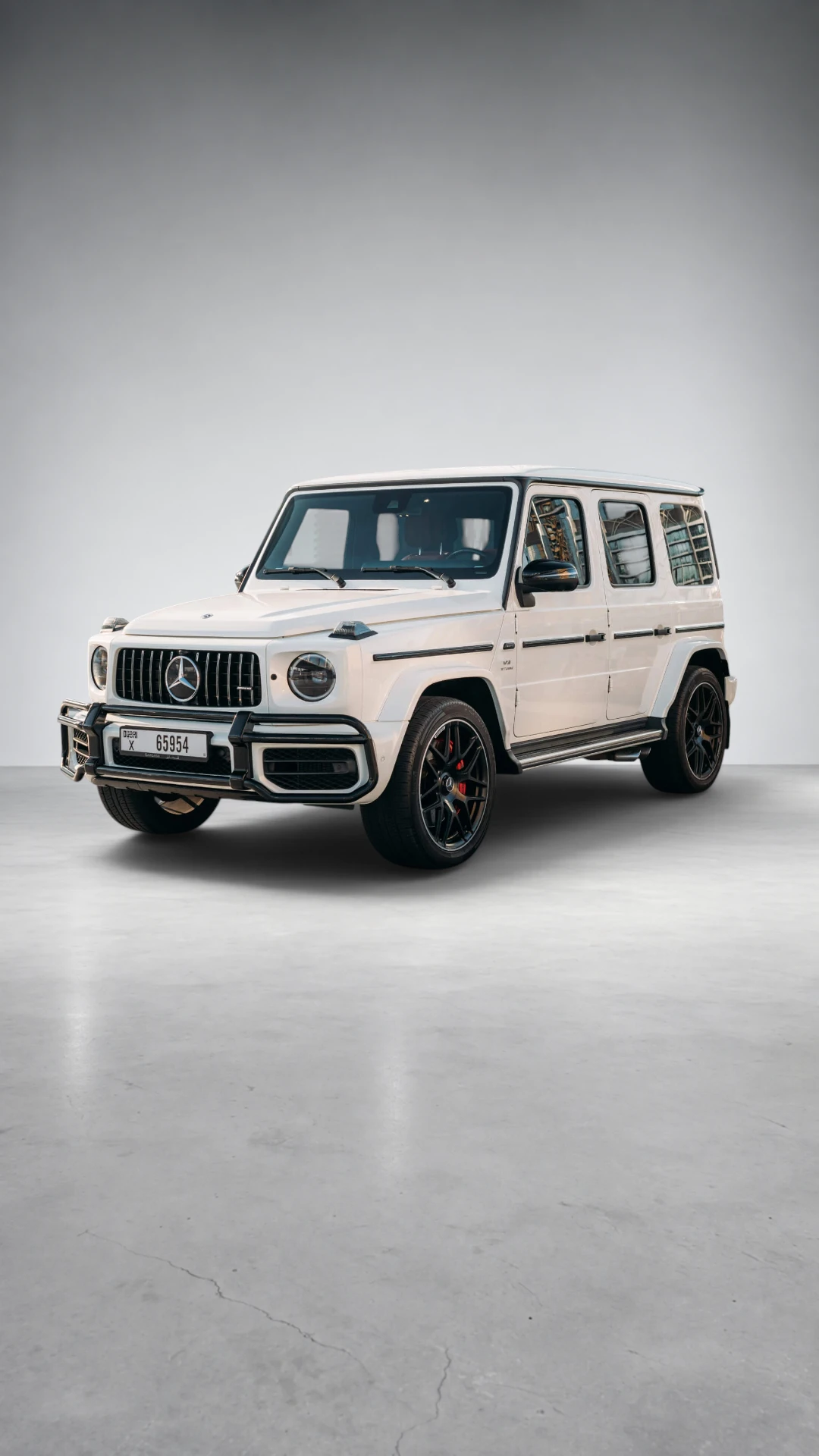 Mercedes-AMG G63 Obsidian Black (Red Interior) Fullbleed Shot