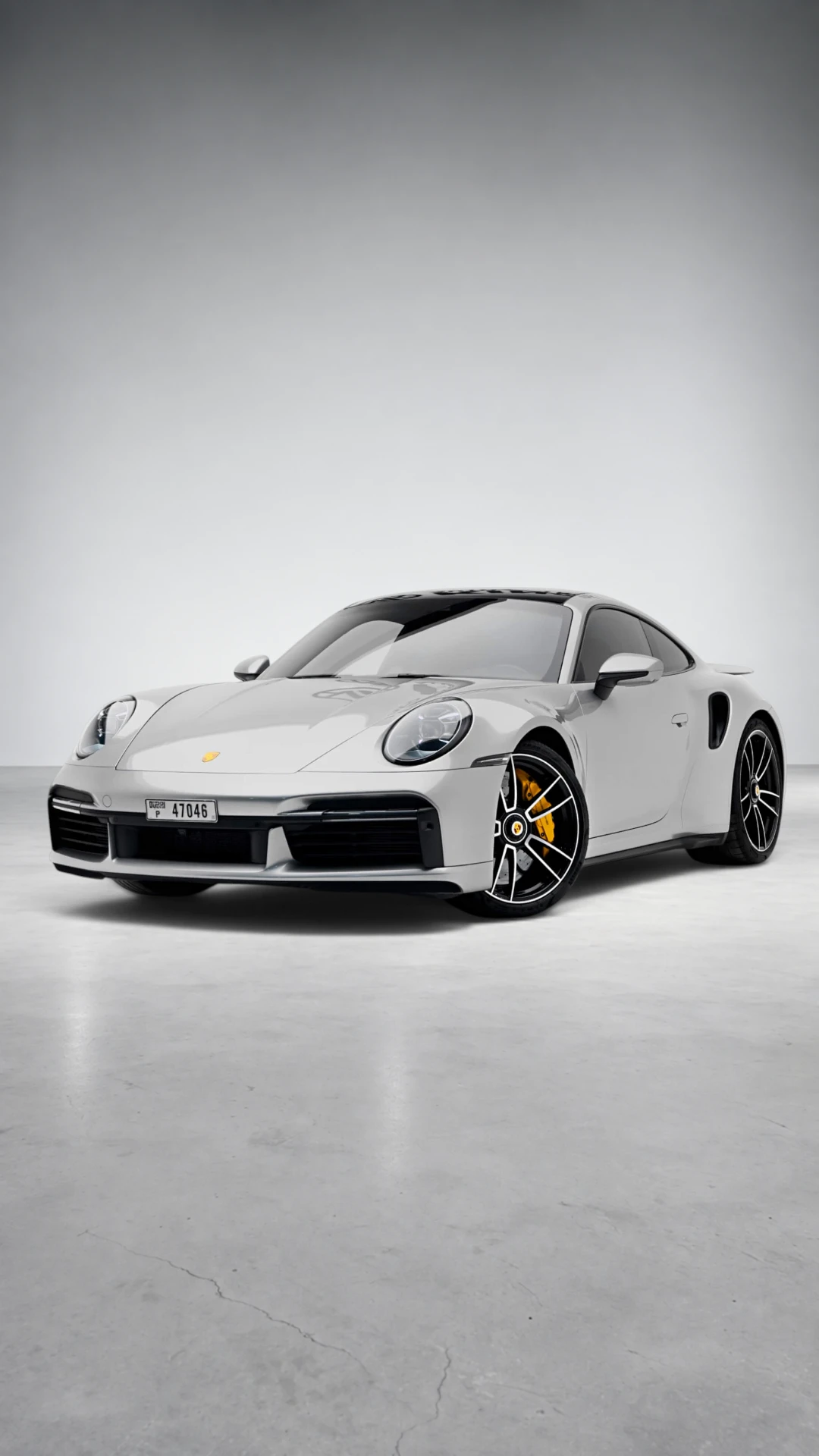 Porsche 911 Turbo S Pure White (Bordeaux Interior) in Dubai